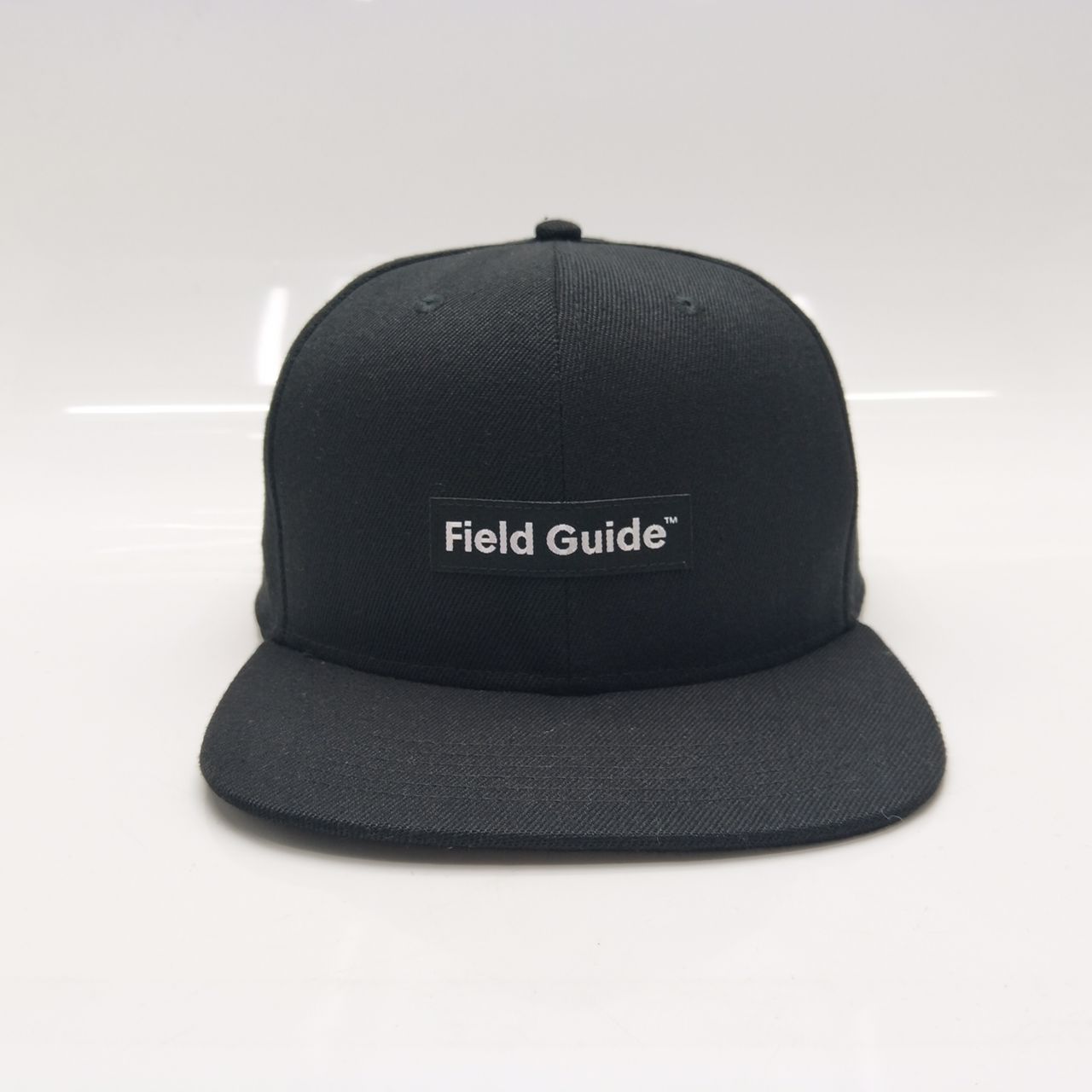 Black Field Guide Snap Back Patch Hat
